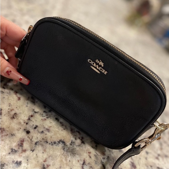 Coach Handbags - Coach Black Leather Wristlet with Gold Hardware